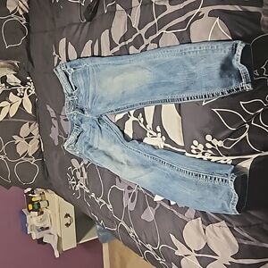 A pair of Miss Me skinny jeans